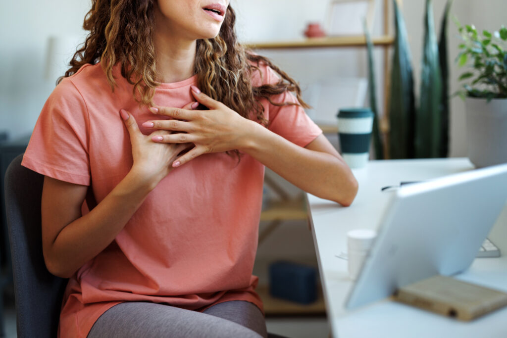 Young woman having online consultation with doctor from home